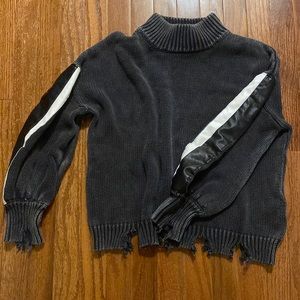 Grey sweater with leather sleeve detail